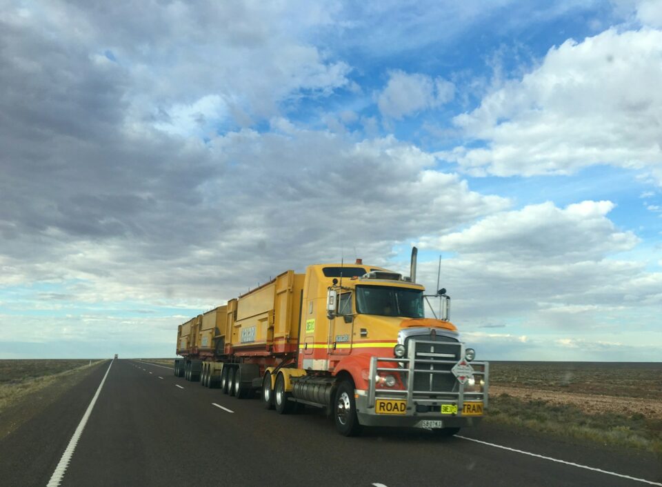 Yellow truck on highway