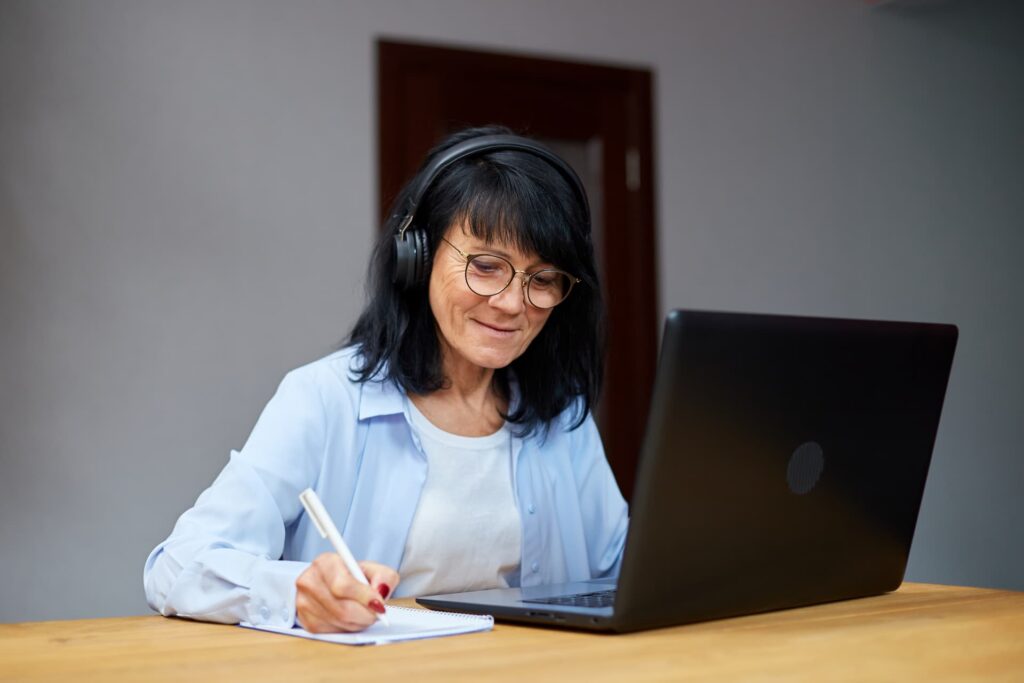 woman on computer taking traffic school