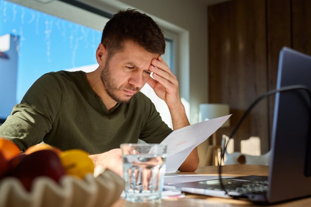 Man reading license suspension document